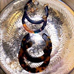 Two pair of tortoise hoops